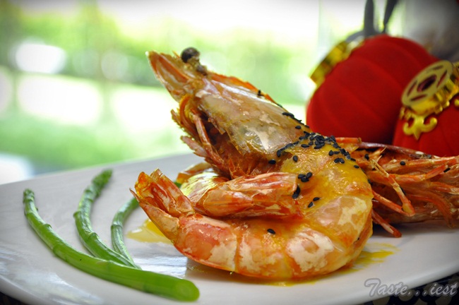 Stir fried tiger prawn with golden pumpkin sauce
