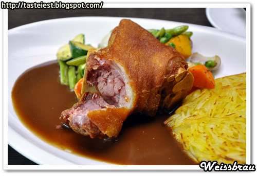 pork knuckle served with homemade red wine sauce